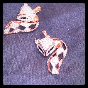 Two rose gold plated and crystal fox pendants